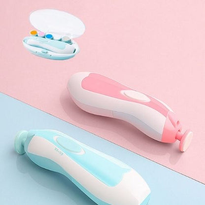 Pink and blue electric nail trimmers for kids with attachments on pastel background