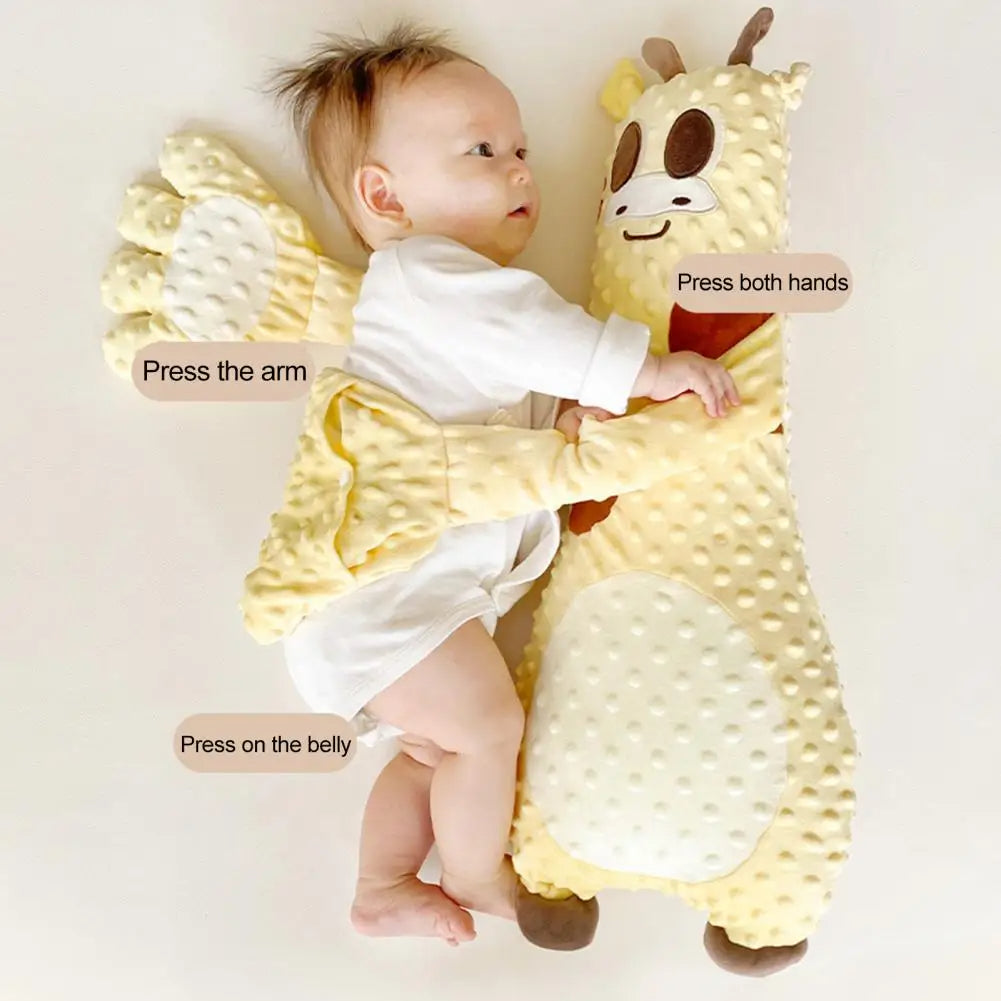 Baby cuddling a plush giraffe sensory toy with interactive press points, cozy kids gift