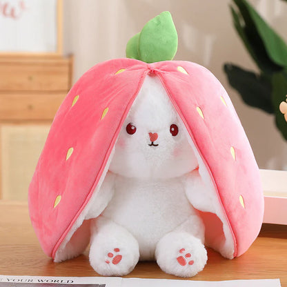 Plush white bunny toy inside a pink strawberry-shaped hood, cute kids room decor